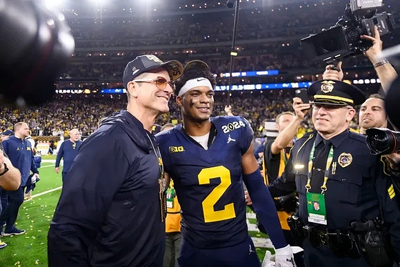 Jim Harbaugh and Will Johnson (2)