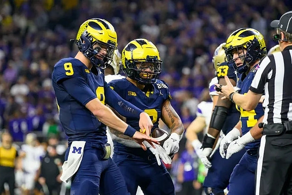 J.J. McCarthy (9), Blake Corum (2), Trente Jones (53), and Max Bredeson (44)
