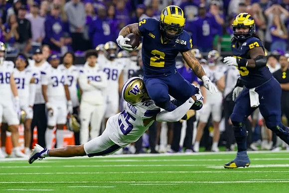 Blake Corum (2) and Trente Jones (53)
