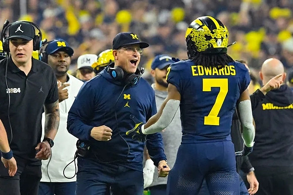 Ron Bellamy, Jim Harbaugh, and Donovan Edwards (7)
