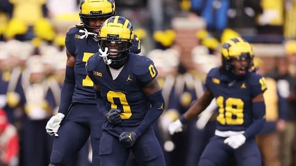 Mike Sainristil (0), Ja'Den McBurrows (18), and Makari Paige (7)