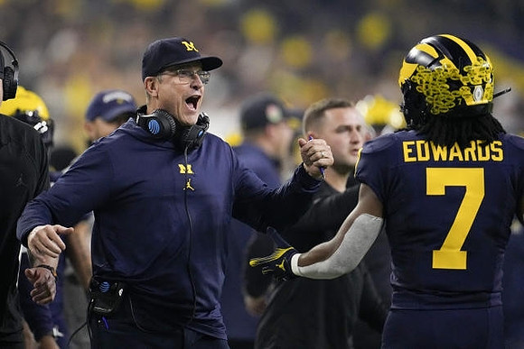 Jim Harbaugh and Donovan Edwards (7)