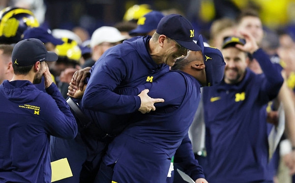 Jesse Minter, Jim Harbaugh, and Sherrone Moore