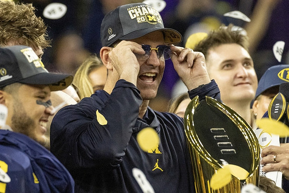Blake Corum (2), Jim Harbaugh, and National Championship Trophy