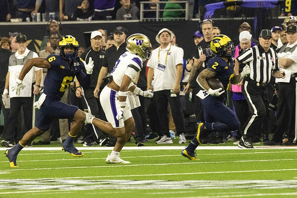 Cornelius Johnson (6) and Blake Corum (2)