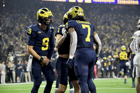 J.J. McCarthy (9), Roman Wilson (1), and Donovan Edwards (7)