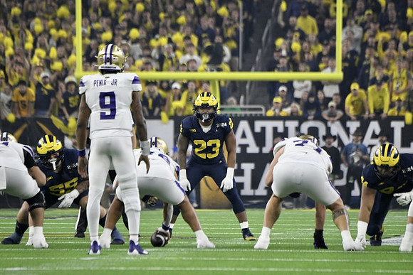 Mason Graham (55), Michael Barrett (23), and Kris Jenkins (94)