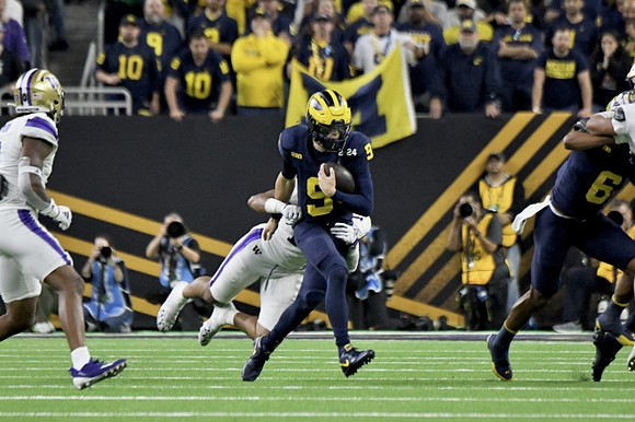 J.J. McCarthy (9) and Cornelius Johnson (6)