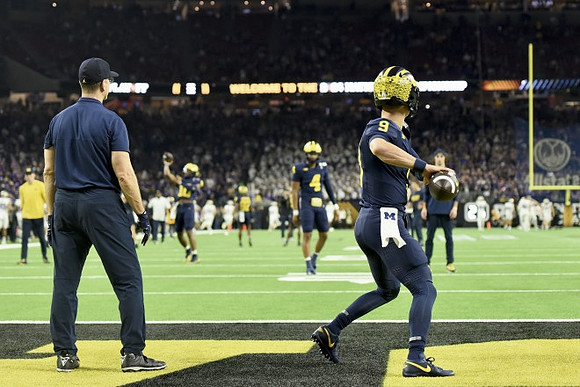 Jim Harbaugh and J.J. McCarthy (9)
