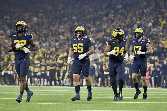 Jaylen Harrell (32), Mason Graham (55), Kris Jenkins (94), and Braiden McGregor (17)