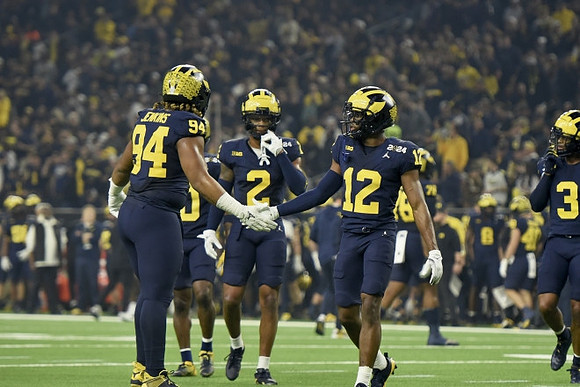 Kris Jenkins (94), Mike Sainristil (0), Will Johnson (2), and Josh Wallace (12)