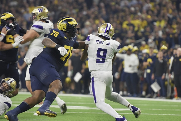 Mason Graham (55) and Kenneth Grant (78)