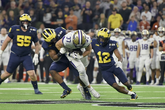 Mason Graham (55) and Josh Wallace (12)