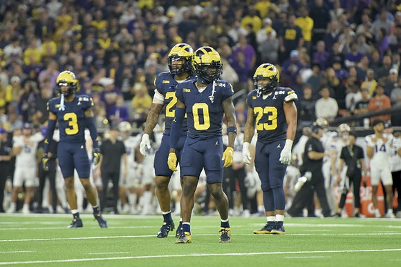 Keon Sabb (3), Junior Colson (25), Mike Sainristil (0), and Michael Barrett (23)