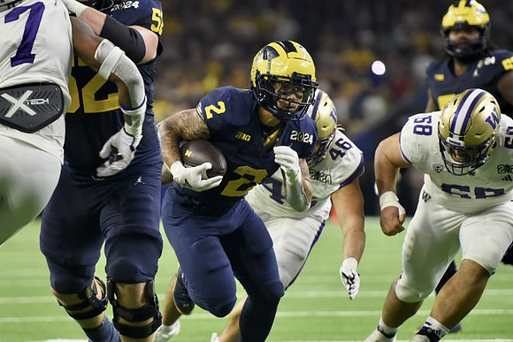 Karsen Barnhart (52), Blake Corum (2), and Trente Jones (53)