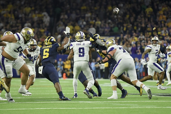 Josaiah Stewart (5) and Derrick Moore (8)