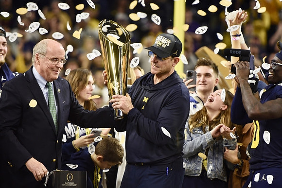 Jim Harbaugh and National Championship Trophy