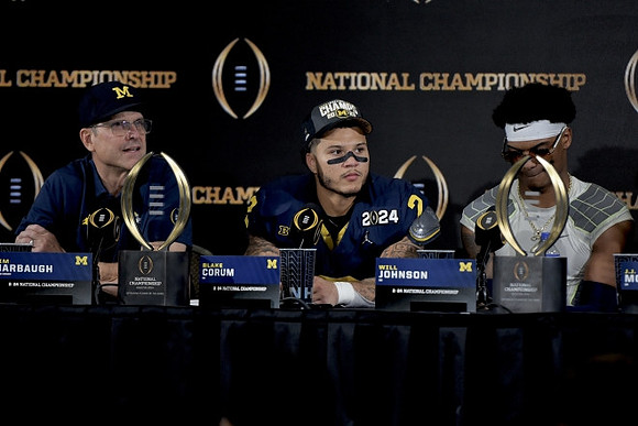 Jim Harbaugh, Blake Corum (2), and Will Johnson (2)