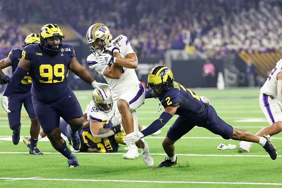 Cam Goode (99), Michael Barrett (23), and Will Johnson (2)