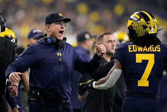 Jim Harbaugh and Donovan Edwards (7)