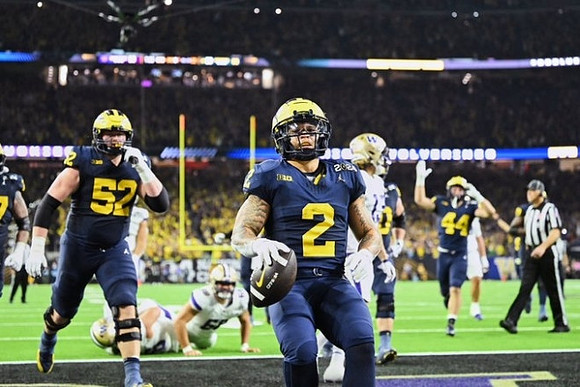 Karsen Barnhart (52), Blake Corum (2), and Max Bredeson (44)