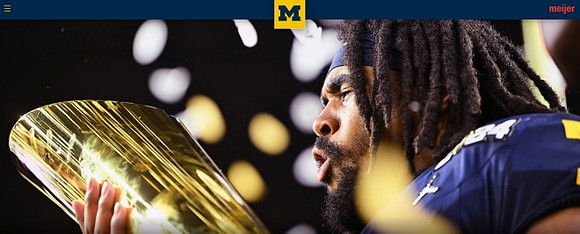 Donovan Edwards (7) and National Championship Trophy