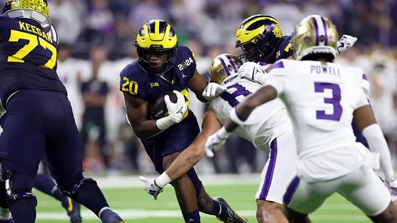 Trevor Keegan (77) and Kalel Mullings (20)