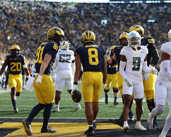 Kalel Mullings (20), Peyton O'Leary (81), Tyler Morris (8), and Giovanni El-Hadi (58)