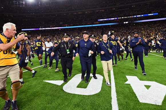 Jim Harbaugh and Michigan Team