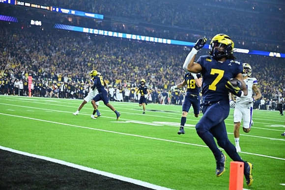 Cornelius Johnson (6), Roman Wilson (1), Colston Loveland (18), and Donovan Edwards (7)