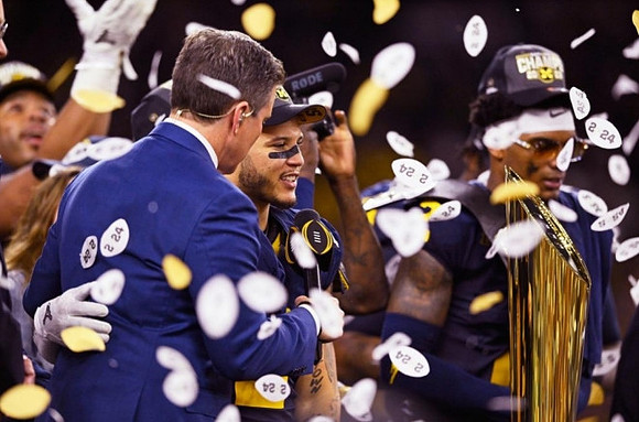 Blake Corum (2), Will Johnson (2), and National Championship Trophy