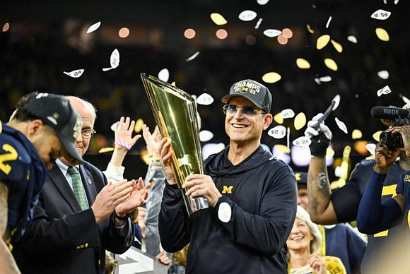 Blake Corum (2), Jim Harbaugh, and National Championship Trophy