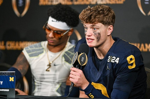 Will Johnson (2) and J.J. McCarthy (9)