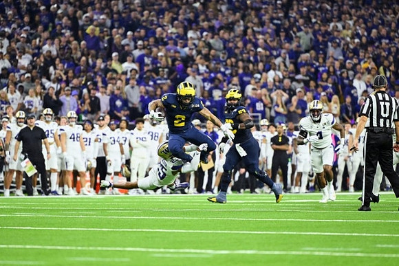 Blake Corum (2) and Trente Jones (53)