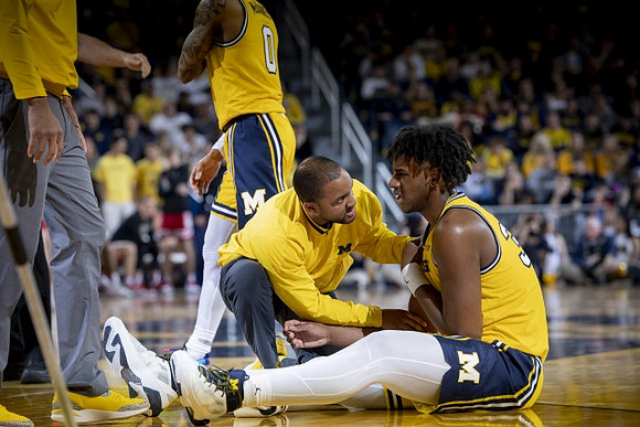 Dug McDaniel (0) and Tarris Reed Jr. (32)