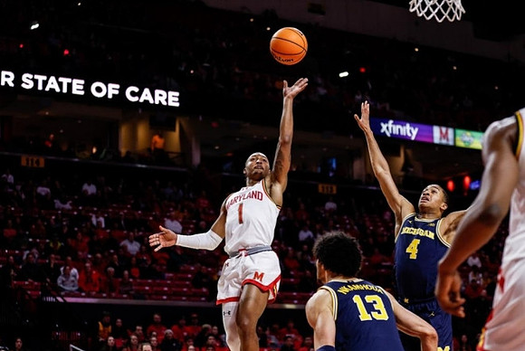 Olivier Nkamhoua (13) and Nimari Burnett (4)