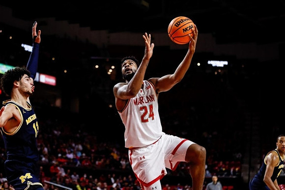 Olivier Nkamhoua (13) and Nimari Burnett (4)