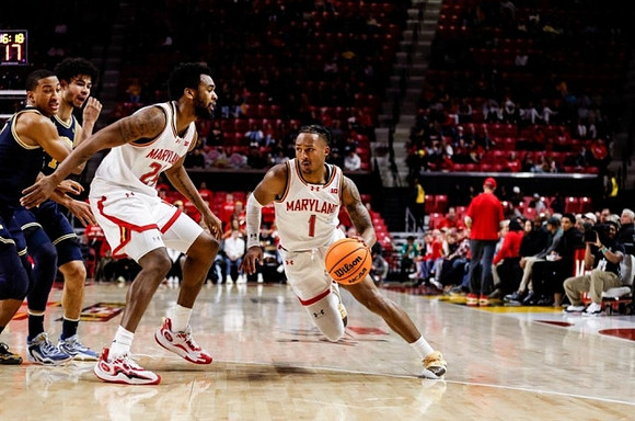 Nimari Burnett (4) and Olivier Nkamhoua (13)