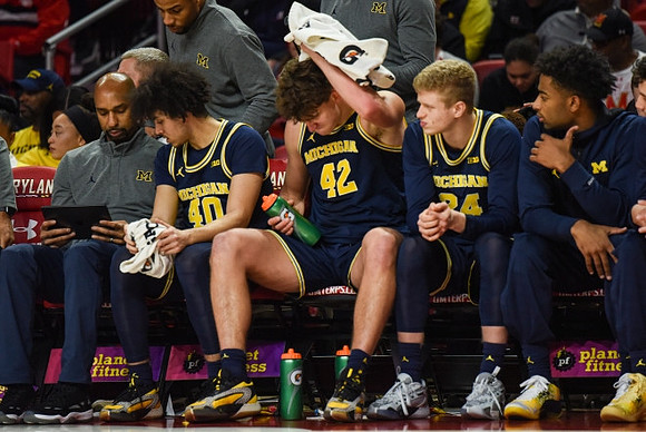 Saddi Washington and Michigan Team