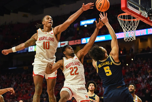Olivier Nkamhoua (13) and Terrance Williams II (5)