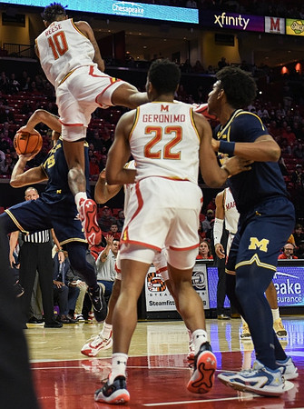 Nimari Burnett (4) and Tarris Reed Jr. (32)