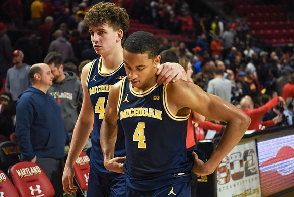 Will Tschetter (42) and Nimari Burnett (4)