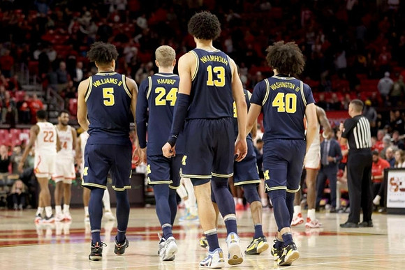 Terrance Williams II (5), Youssef Khayat (24), Olivier Nkamhoua (13), and George Washington III (40)