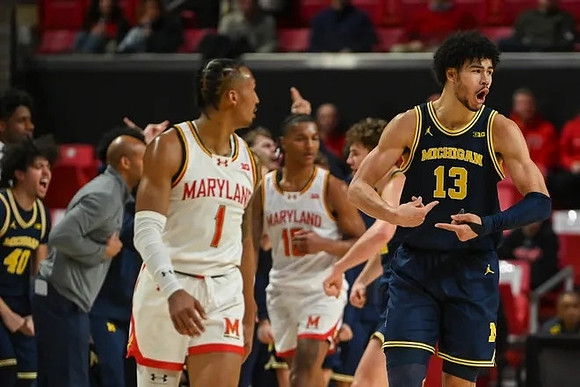 George Washington III (40) and Olivier Nkamhoua (13)