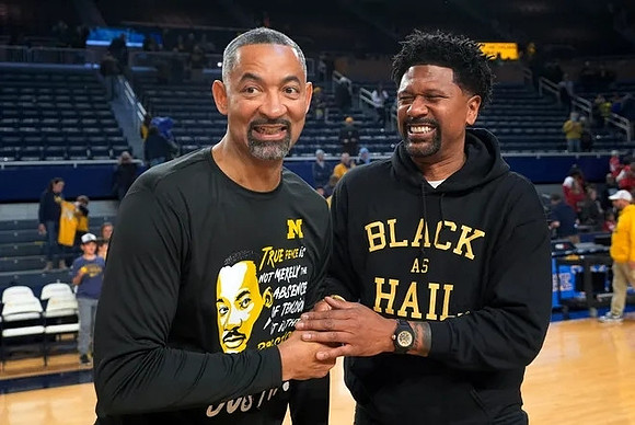 Juwan Howard and Jalen Rose