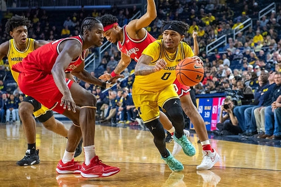 Tarris Reed Jr. (32) and Dug McDaniel (0)