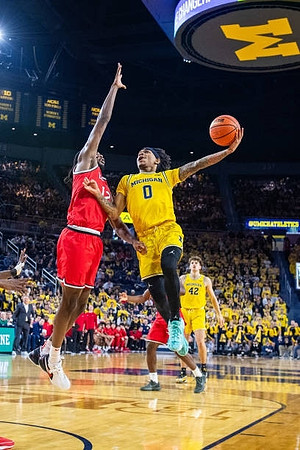 Dug McDaniel (0) and Will Tschetter (42)