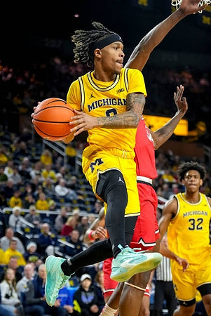 Dug McDaniel (0) and Tarris Reed Jr. (32)
