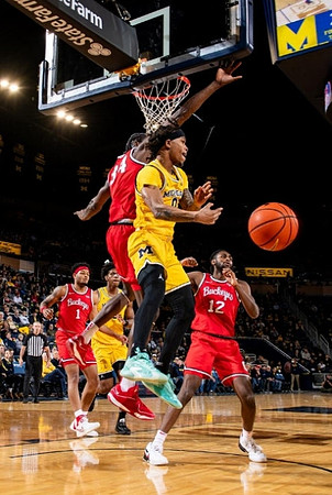 Dug McDaniel (0) and Tarris Reed Jr. (32)