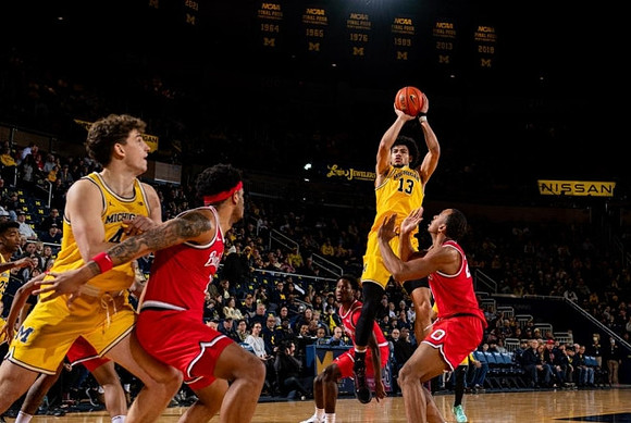 Will Tschetter (42) and Olivier Nkamhoua (13)